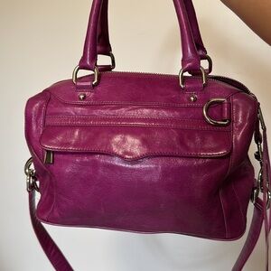 Rebecca Minkoff purple crossbody purse.